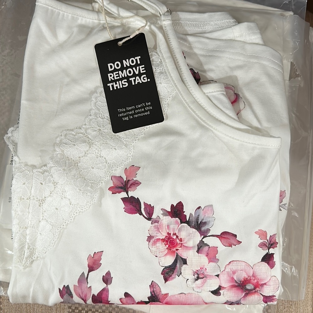 Floral tank in medium, brand new with tag.